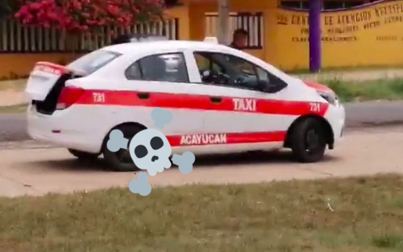 Dejan cuerpo desmembrado en taxi de Acayucan