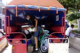 Sanitizan vehículos del transporte publico en Yecuatla Veracruz