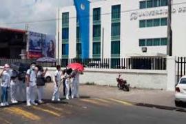 Universitarios bloquean carretera Veracruz-Medellín por alza de colegiaturas